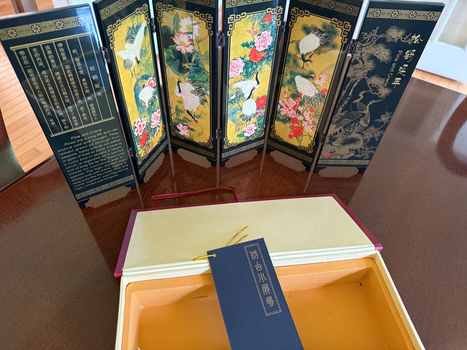 Asian Lacquer Table Folding Screen features a beautiful “Pine & Crane” scenes