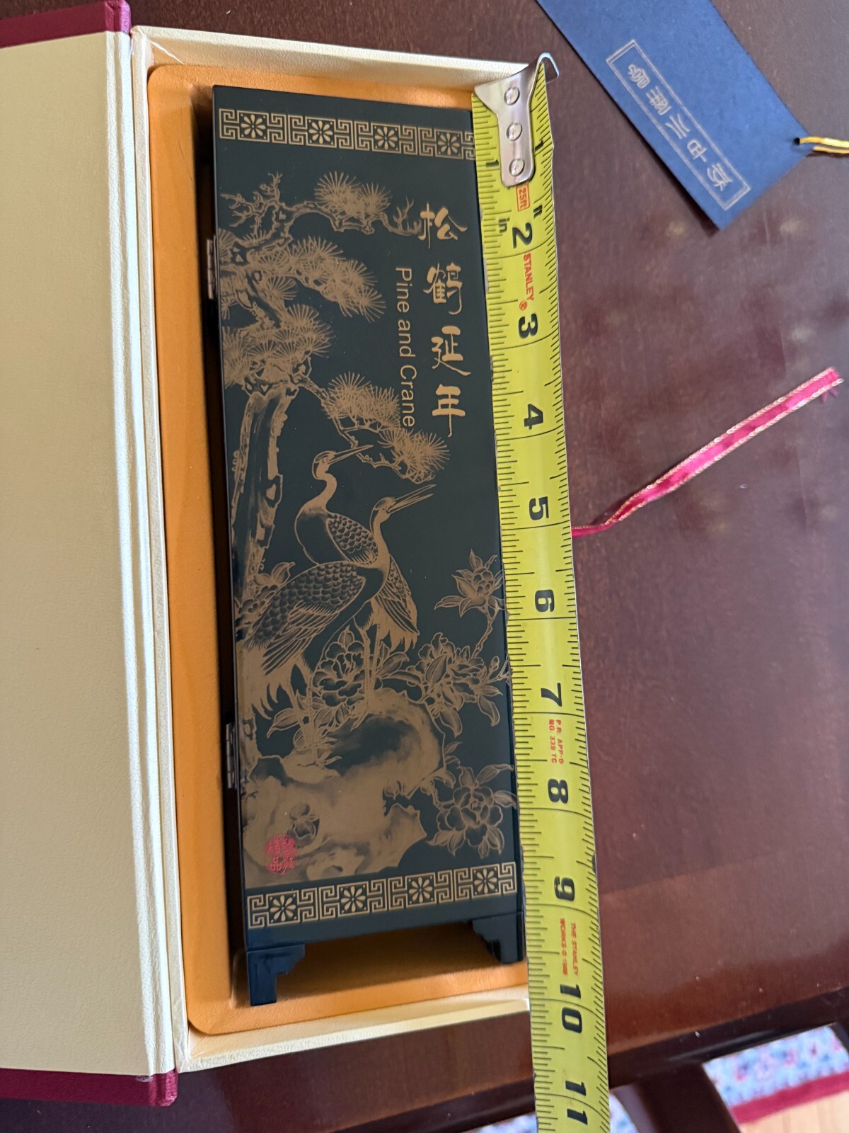 Asian Lacquer Table Folding Screen features a beautiful “Pine & Crane” scenes