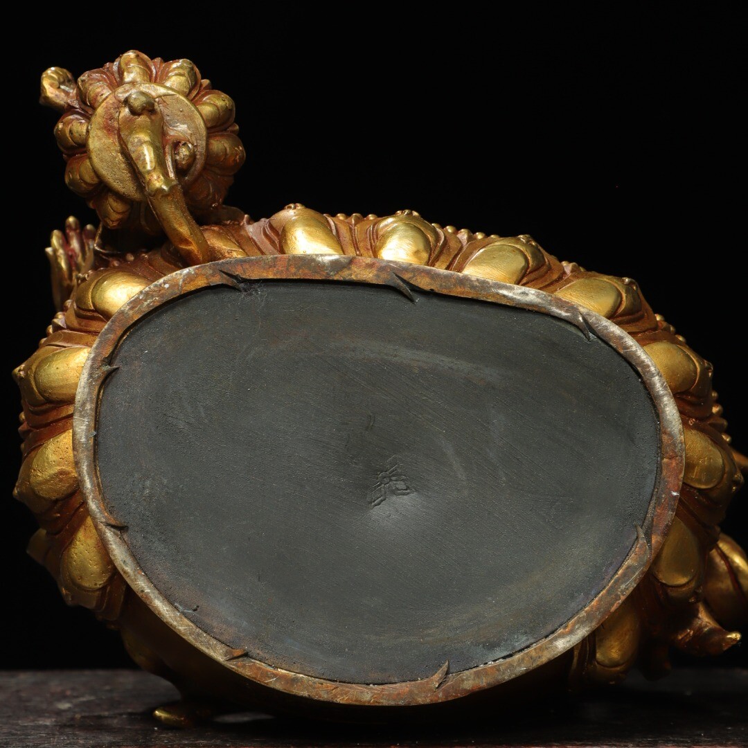 Bronze gilded statue of the Yellow God of Wealth Buddha