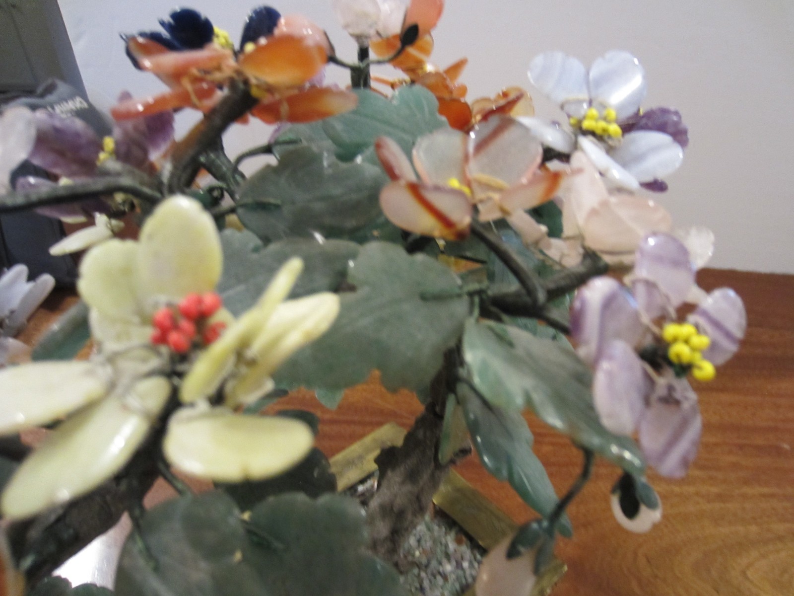 large jade/stone bonsai tree with many flowers of jade, agate, amethyst,& others