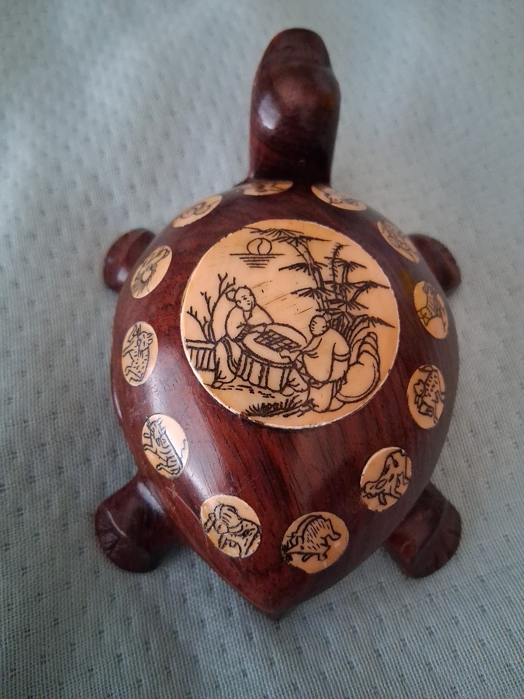 carved wood turtle with enlayed compass and chinese carved symbols