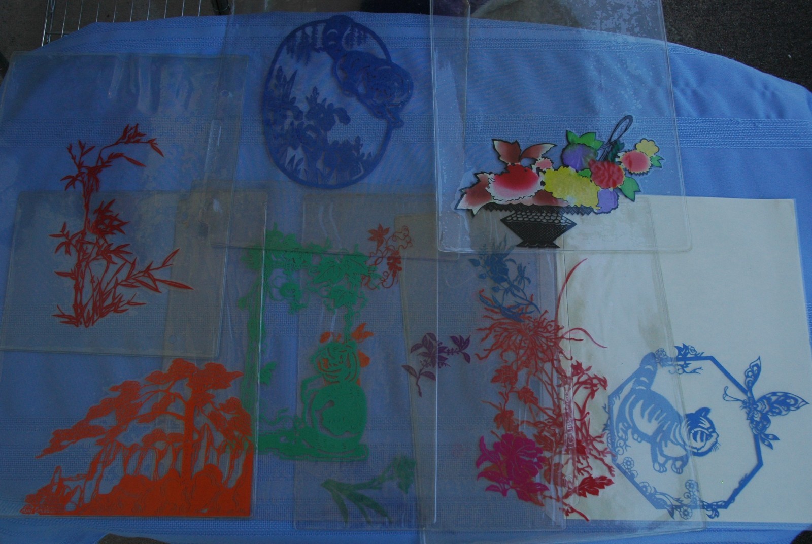 Vintage Lot of about 70 Chinese Paper Cuts in Plastic Protector Sheets Plus Book