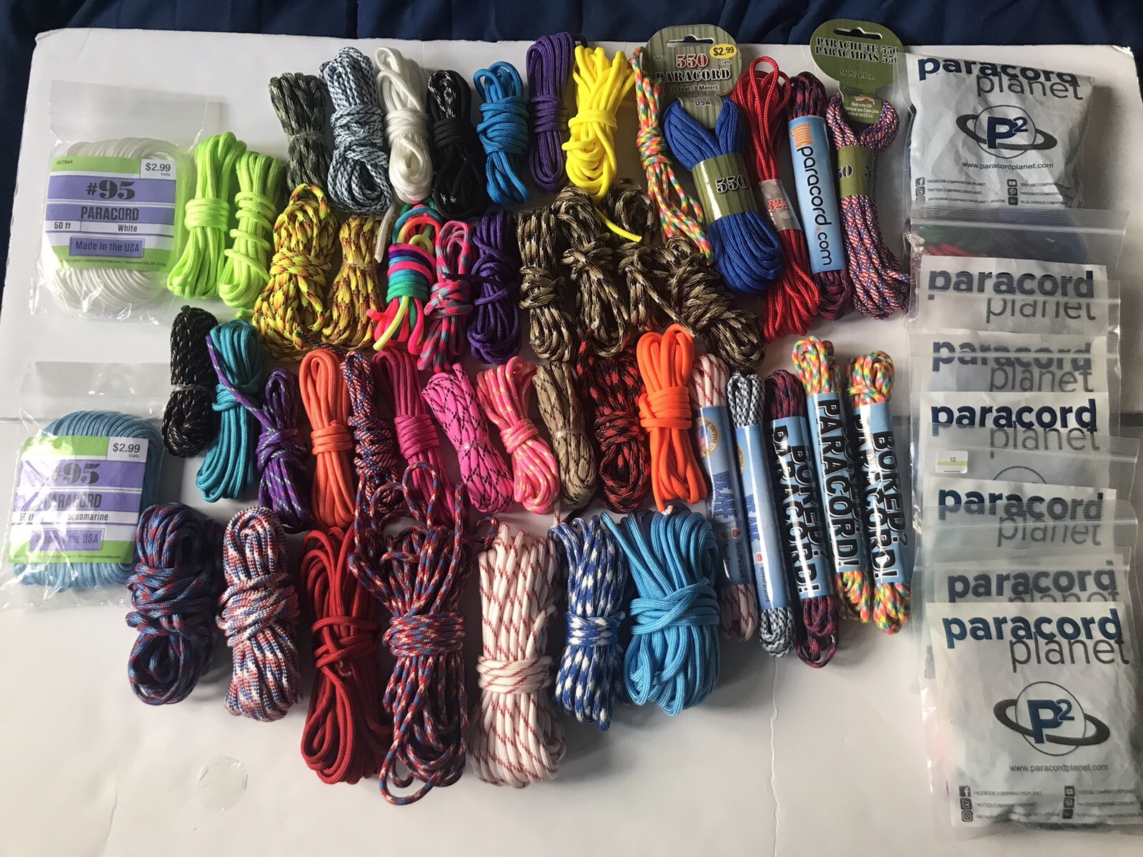 MIXED LOT OF 3+ POUNDS OF PARACORD ASSORTED COLORS AND DESIGNS SOME NEW IN PACK