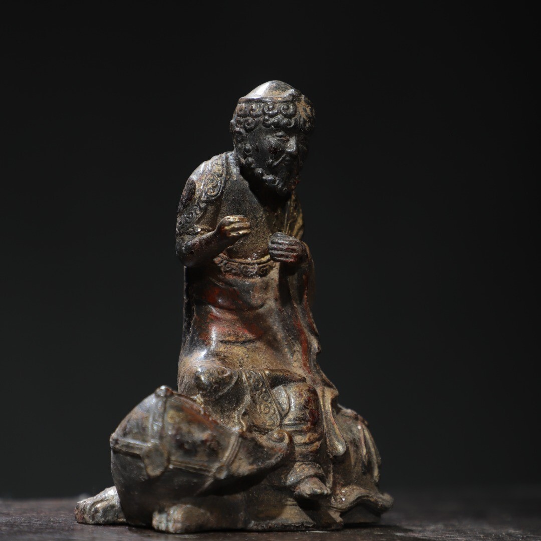Bronze and gold [Arhat] Buddha statue