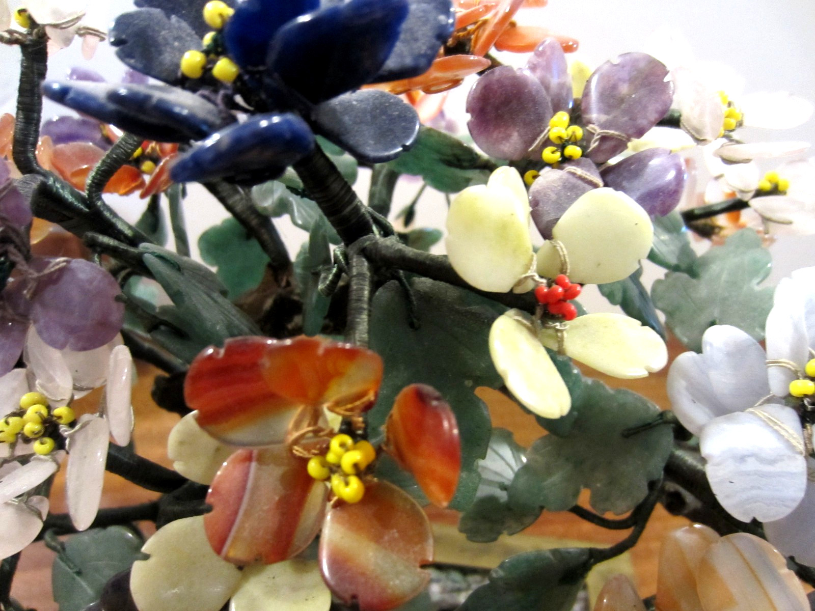 large jade/stone bonsai tree with many flowers of jade, agate, amethyst,& others
