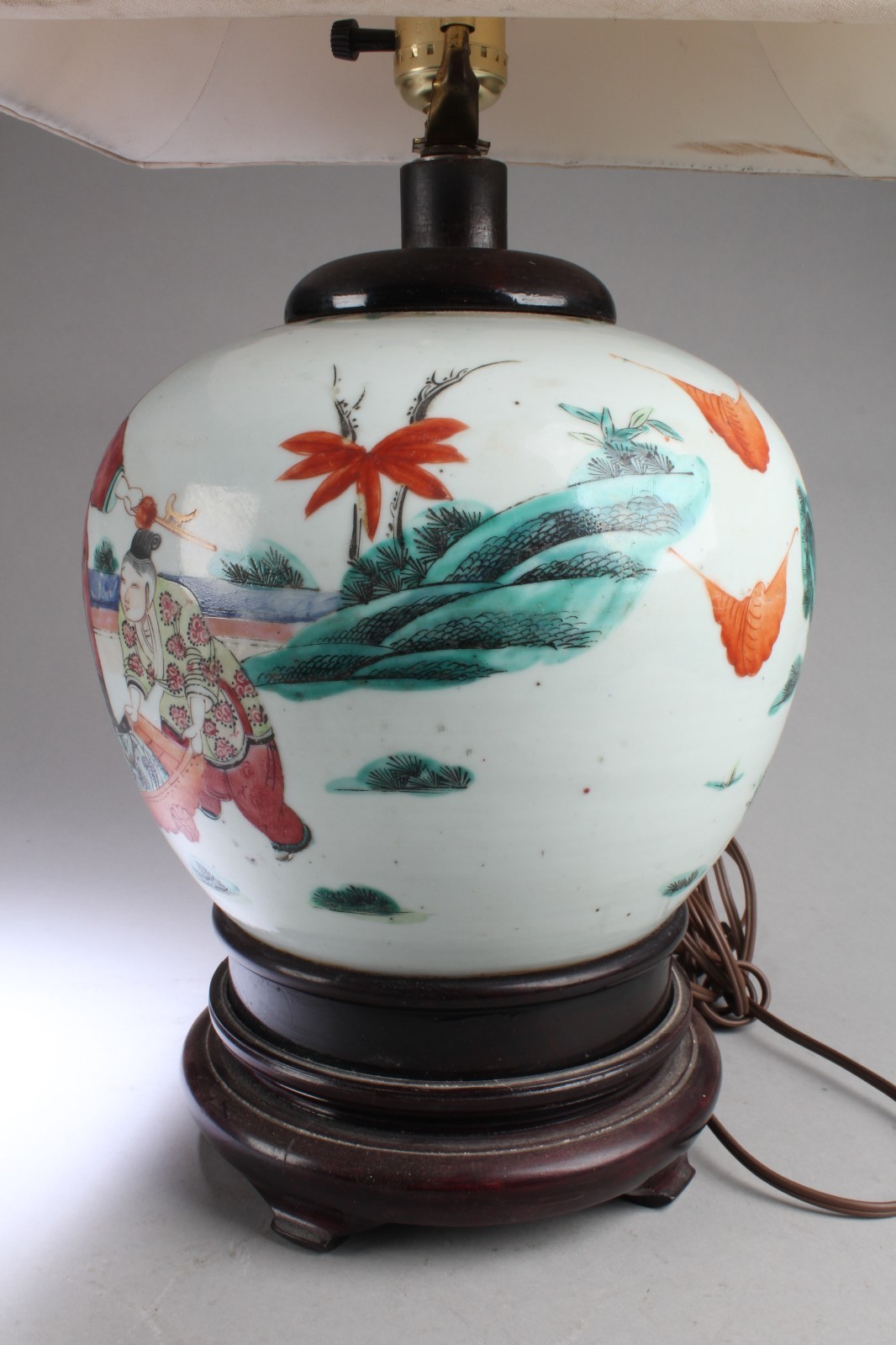 Chinese Porcelain Lamp with shade. Comes fitted with a wood stand